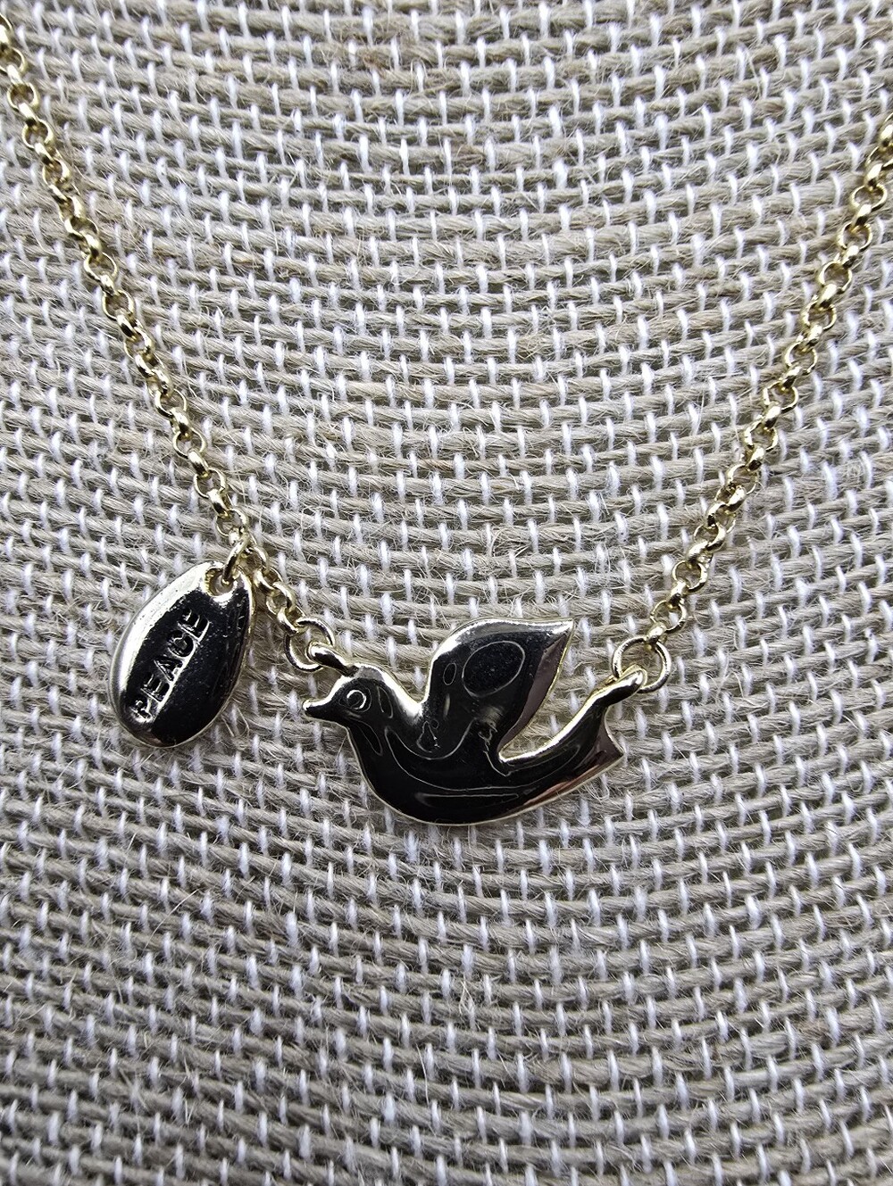 Cookie Lee Gold Tone Dove Pendant Necklace With Peace Tag